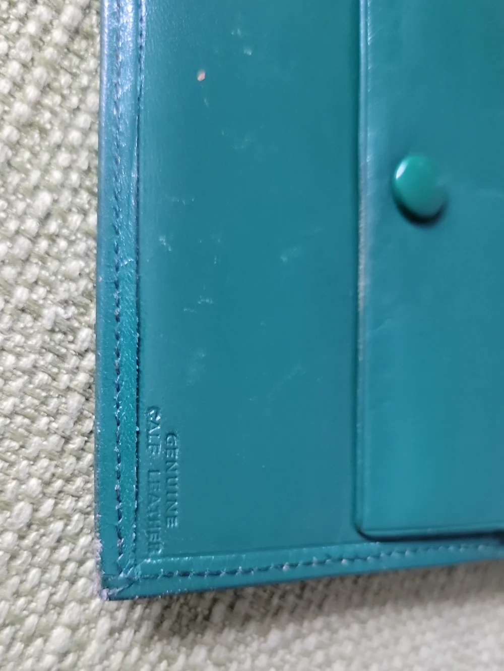 Green Leather Bifold Wallet with Gold Goat Accent